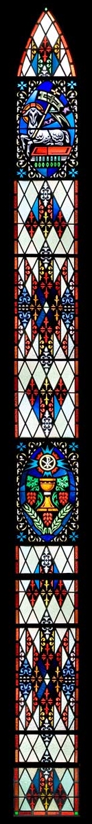 Jesus, the Lamb, as victor and in control of the events of the world, events symbolized by the seven seals; The Lord's Supper. Martin Luther Lutheran Church, Oshkosh, WI. Used with permission from WELS Stained Glass.org.